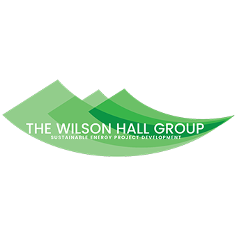 Logo of The Wilson Hall Group with green geometric shapes.